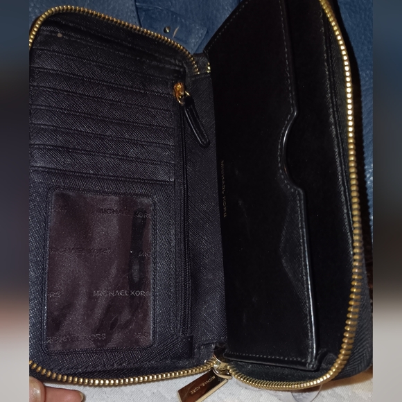 Michael Kors black zip around wallet with ID slot, phone,card, and coin slots - Picture 8 of 9
